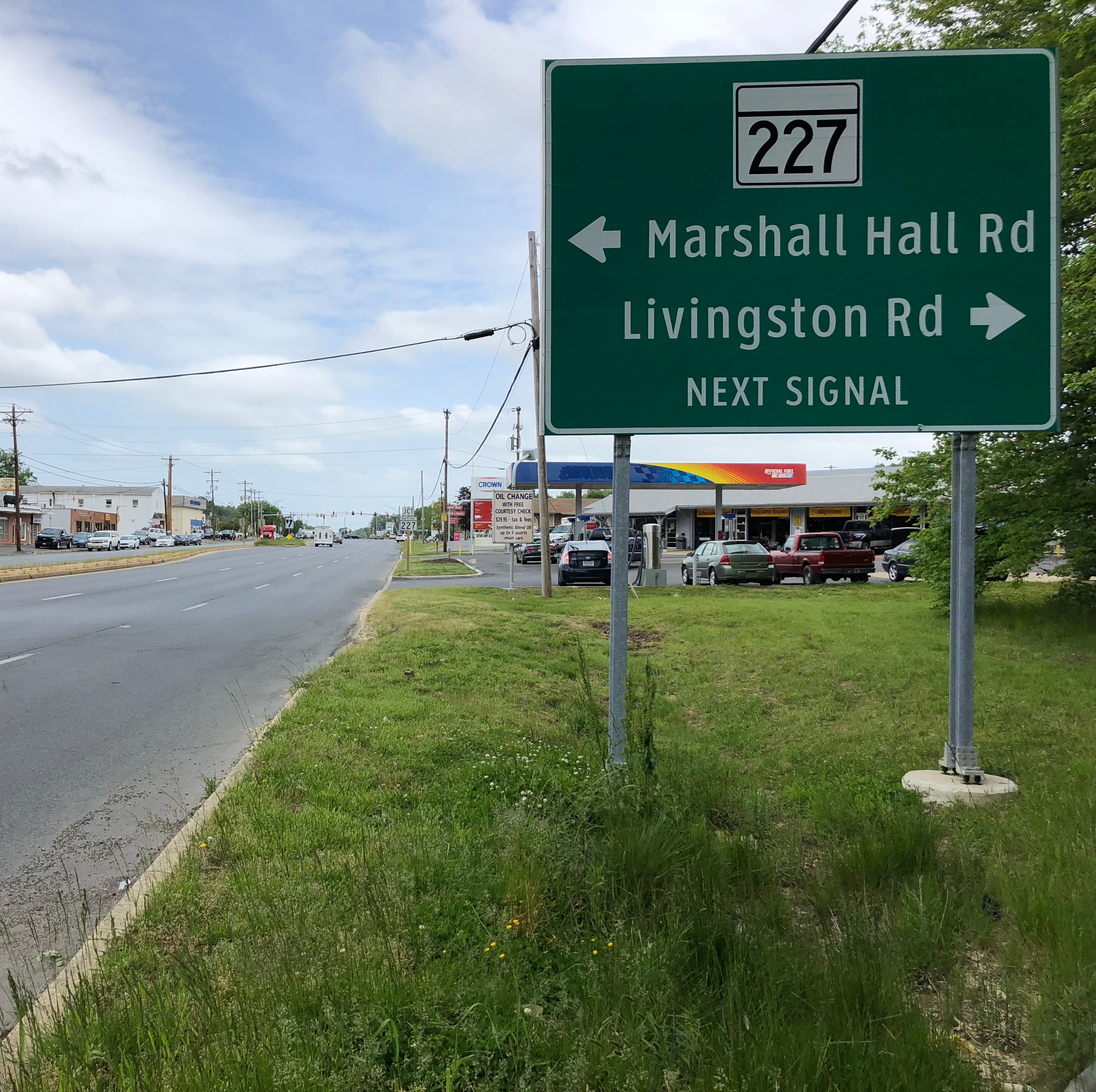Road sign with directions to Marshall Hall Rd and Livingston Rd.